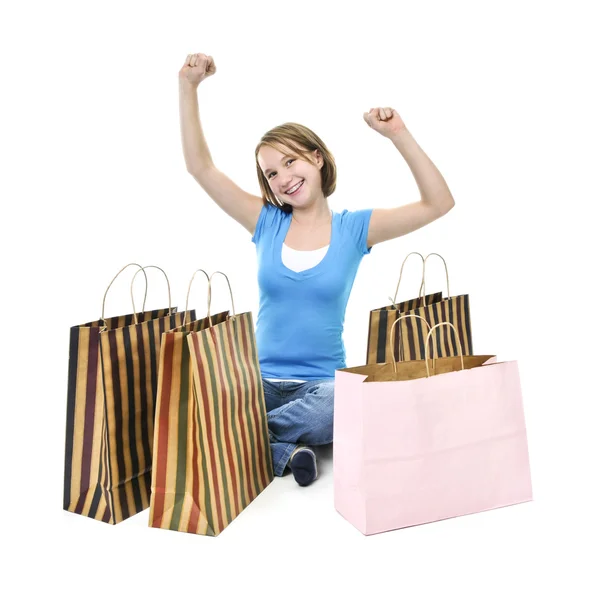 Tienermeisje met shopping tassen — Stockfoto