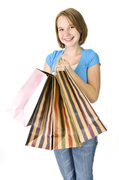Tienermeisje met shopping tassen — Stockfoto