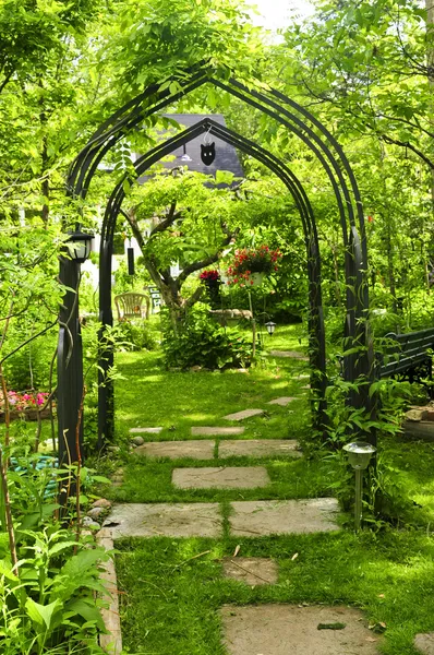 Lush Green Garden Wrought Iron Arbor — Stock Photo, Image