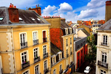 Street with colorful houses in Rennes, France, top view clipart