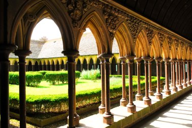 Fragment of a cloister in Mont Saint Michel abbey in France clipart