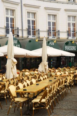 Empty restaurant patio in Vannes, Brittany, France clipart