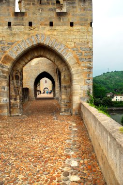 Medieval Valentre bridge in Carhors in southwest France clipart