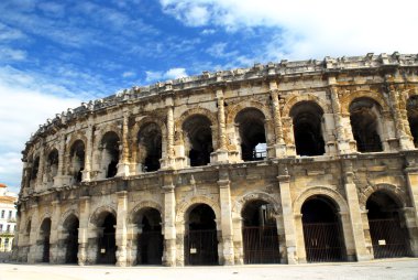 Roman arena in city of Nimes in southern France clipart