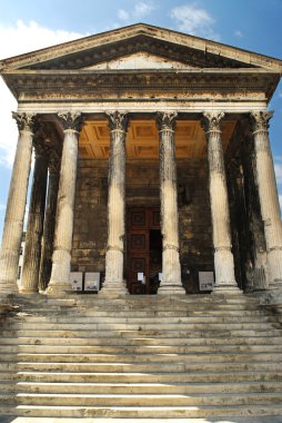 Roman temple in Nimes France clipart