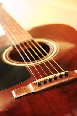 Musical instrument acoustic guitar close up in perspective clipart