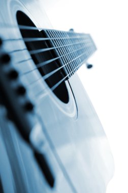 Acoustic guitar close up on white background clipart