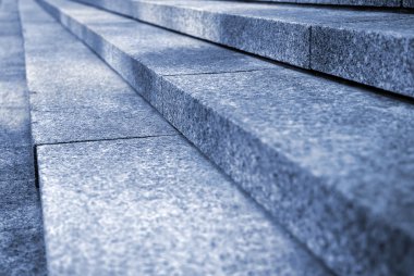 Close up on granite stairs in perspective clipart