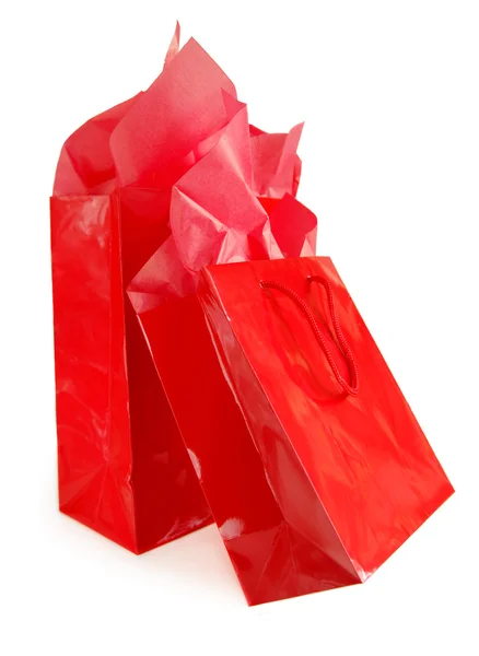 白い背景上に分離されて つの赤いショッピング バッグ — ストック写真