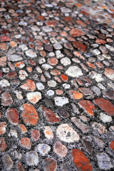 古い中世の玉石の舗装道路の抽象的な背景 — ストック写真