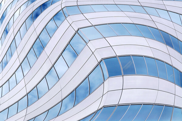 Abstract background of distorted office building walls