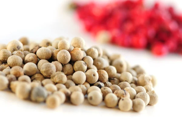 Red and white peppercorns — Stock Photo, Image