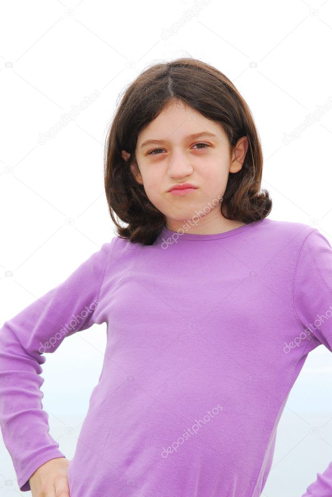 Portrait of a young preteen girl with attitude