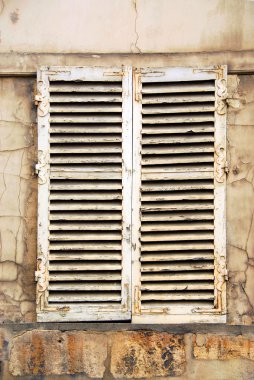 Old window with shatters in Paris France clipart