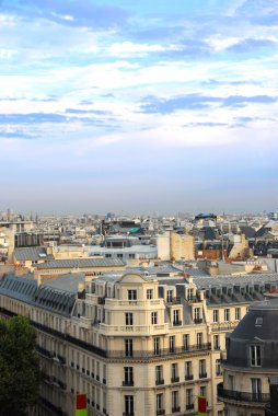 View on Paris rooftops with blue sky clipart