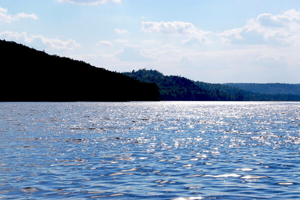 Sparkiling blue lake in Algonquin provincial park, Canada