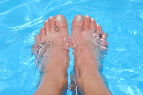 Feet in water — Stock Photo, Image