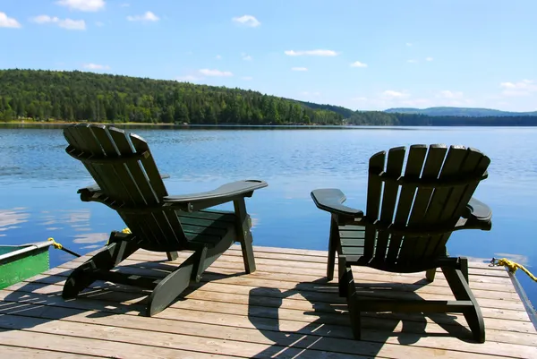 Chairs on dock — Stock Photo, Image