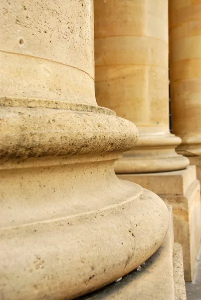 stock image Closeup of row of stone columns in perspective