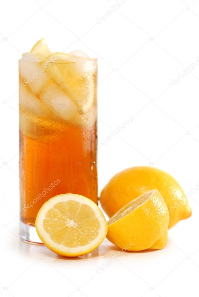 Glass of lemon cold iced tea with lemons on white background