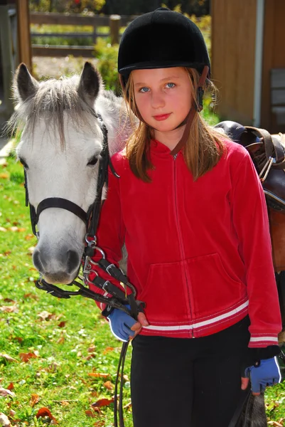 Girl and pony — Stock Photo, Image
