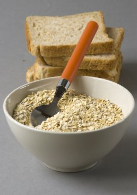 Bowl with oats, isolated clipart