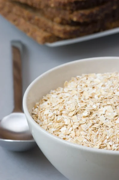 Bowl with oats, isolated — Stock Photo, Image