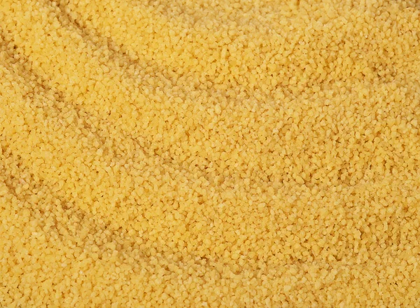 Cuscus, grani di miglio, sfondo — Foto Stock