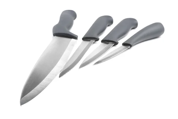 Cuatro cuchillos aislados con sombra — Foto de Stock