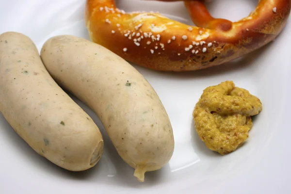 stock image Bavarian veal sausage with pretzel and mustard