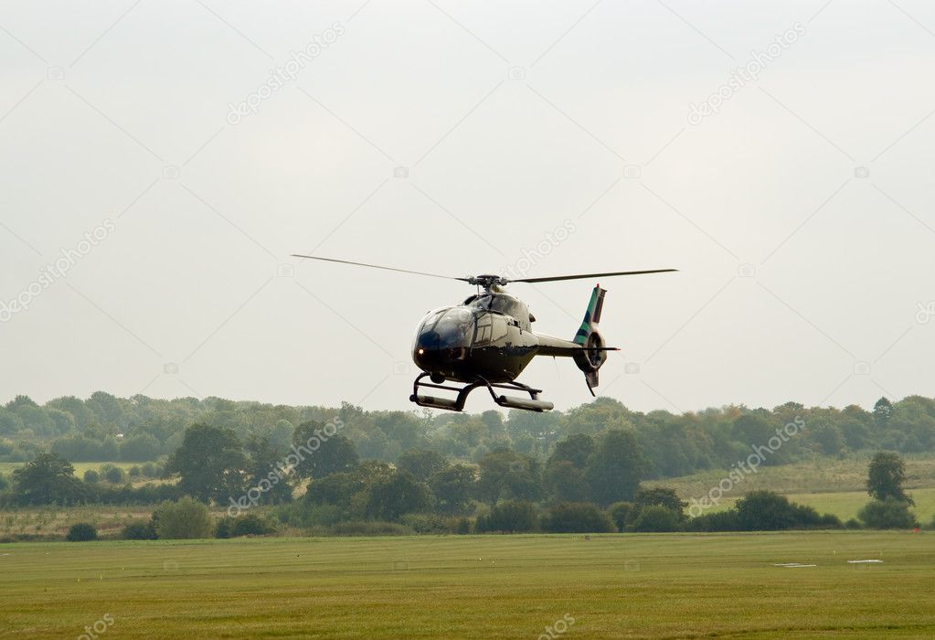 Black EC-120 hovering