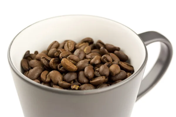 Cup of Coffee Beans Royalty Free Stock Photos