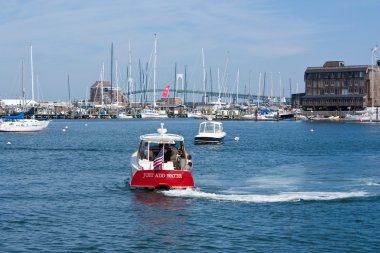 Boating in a harbor clipart