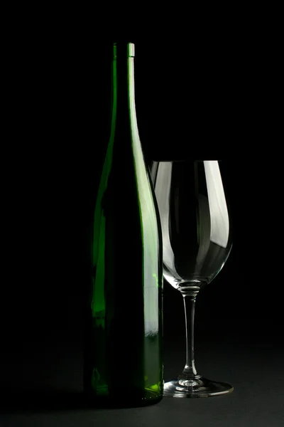 Garrafa de vinho e copo de vinho Fotografias De Stock Royalty-Free