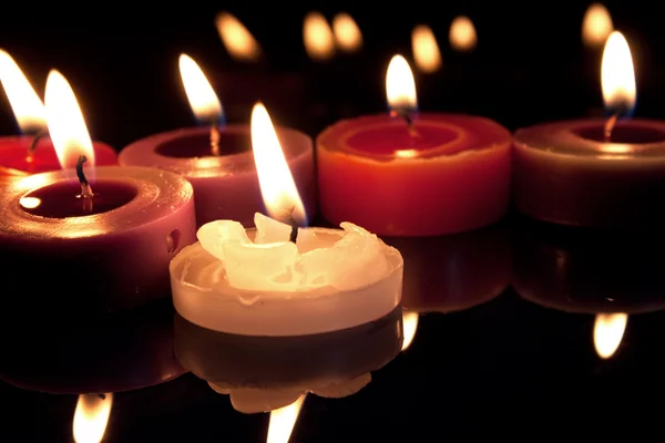 White, red and purple candles — Stock Photo, Image