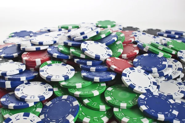 Poker žetony rozptýlené — Stock fotografie