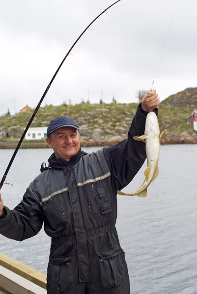 A mólón, a sziget skrova halász — Stock Fotó
