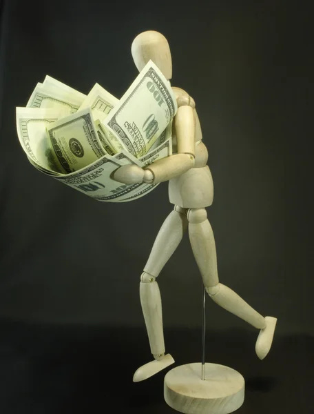 Mannequin with dollars — Stock Photo, Image