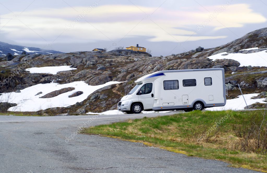 Caravan van on high-mountainous road of Norway