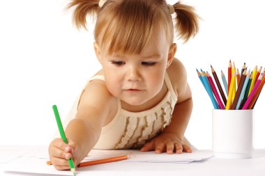 Cute child draw with crayons clipart