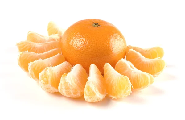 Fresh mandarin decorated with slices — Stock Photo, Image