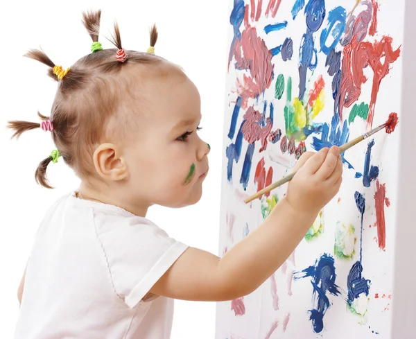 在板上的小女孩油漆 — 图库照片