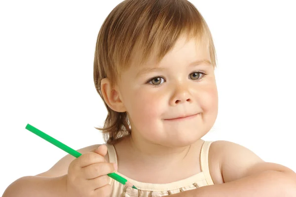 Niedliches Kind mit grünem Buntstift — Stockfoto