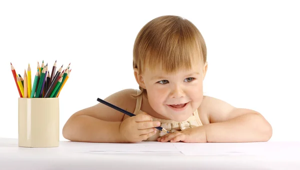 Criança feliz desenhar com lápis de cor azul — Fotografia de Stock