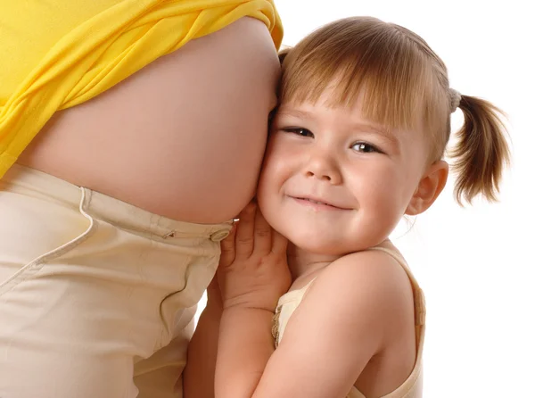 Tochter und ihre schwangere Mutter — Stockfoto