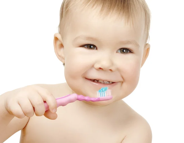 Lindo niño con cepillo de dientes Fotos De Stock