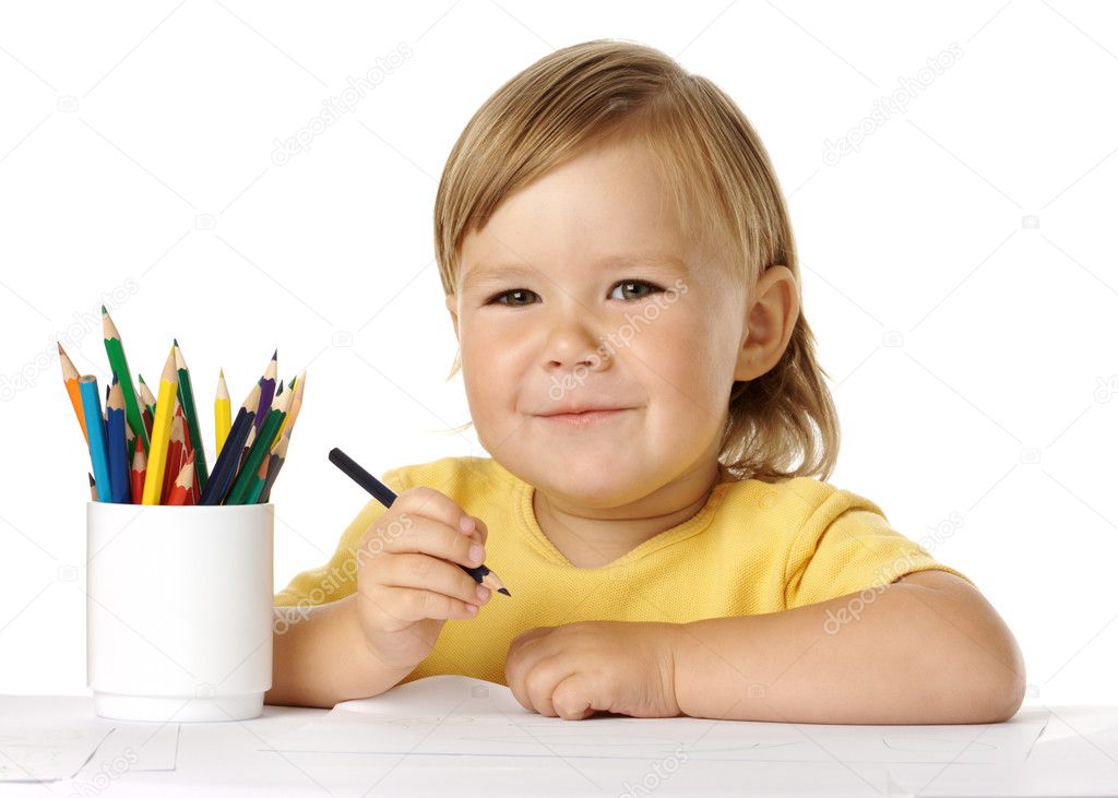 Happy child draw with crayons