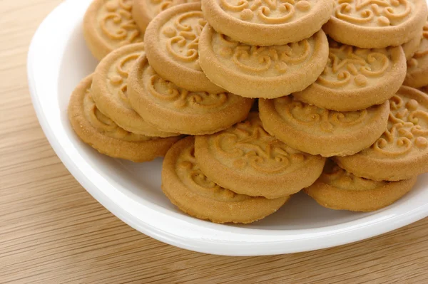Yellow cookies on plate