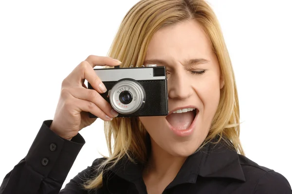 Vrouw die een schot met fotocamera — Stockfoto