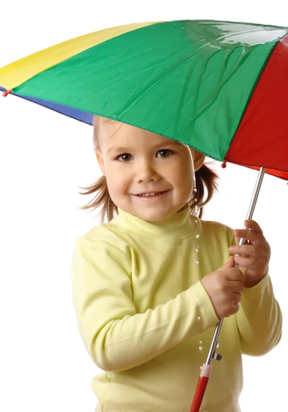 stock image Child catching raindrops under umbrella